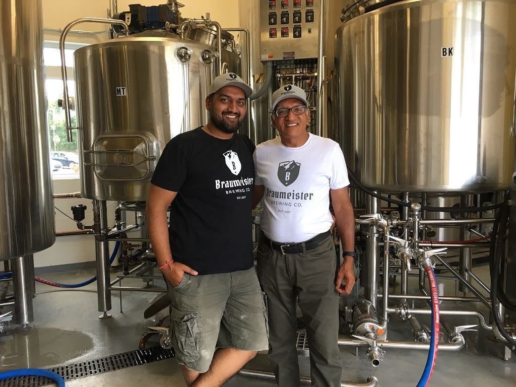 Two people in brewery