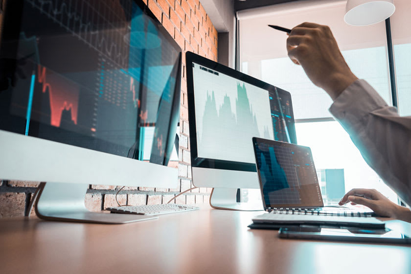 CFO pointing showing new IPO readiness checklist to colleague