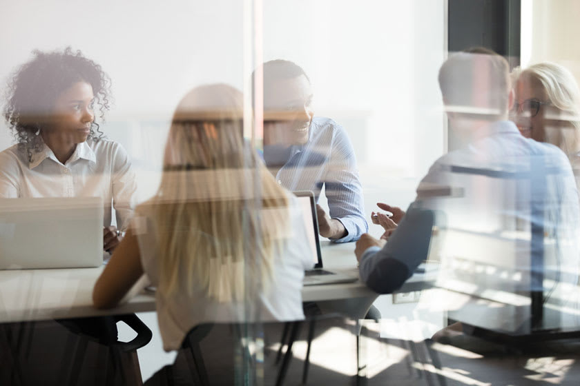 m&a manager going over new strategies to reduce process friction with CFO and other leaders