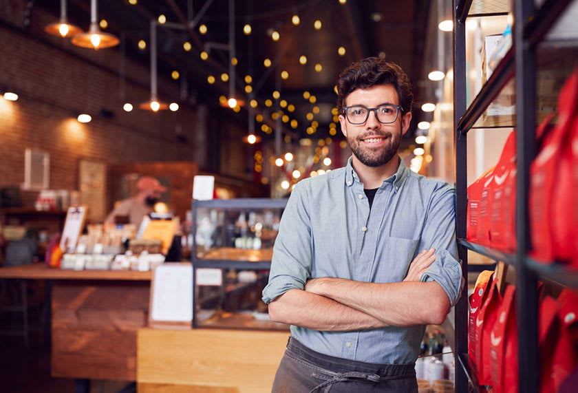 Small restaurant owner posing for the camera