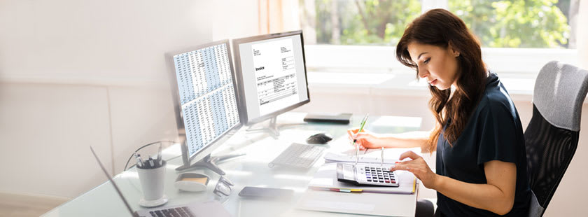 female Chief Financial Officer using new AI agent to speed up change in payroll process