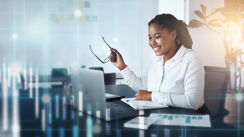 CFO checking software adoption rate throughout business with technology graphics overlay.jpg