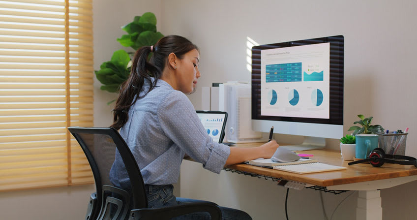 accounting clerk preparing report on their outsourcing results