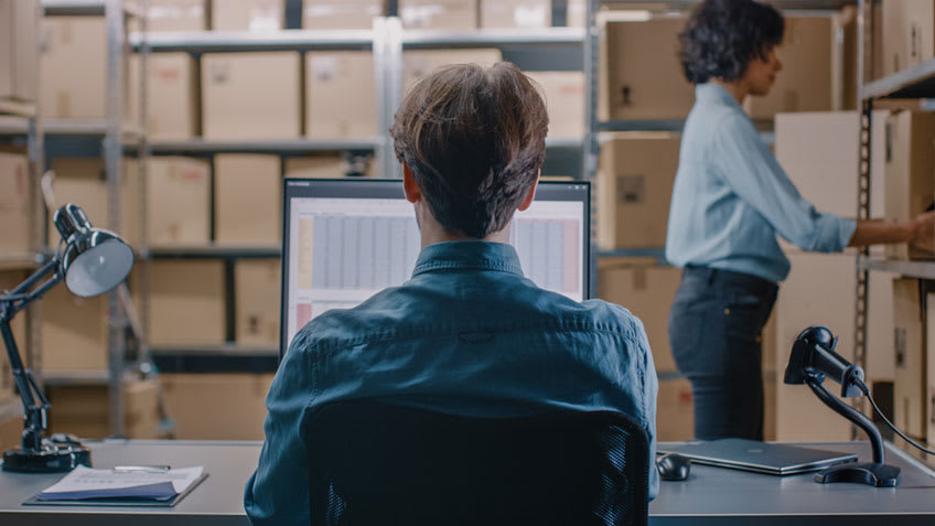accounting outsourcing expert working at new logistics warehouse