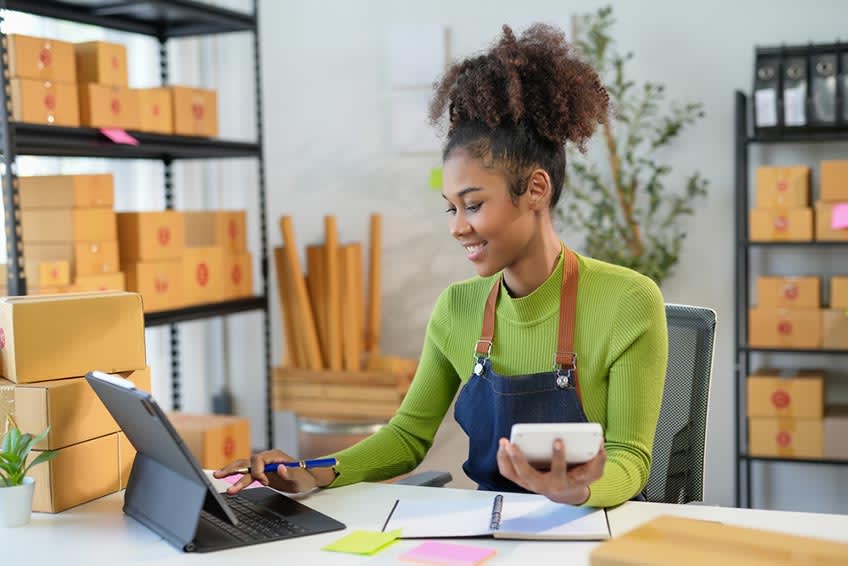 logistics company owner reviewing accounting cash flow numbers