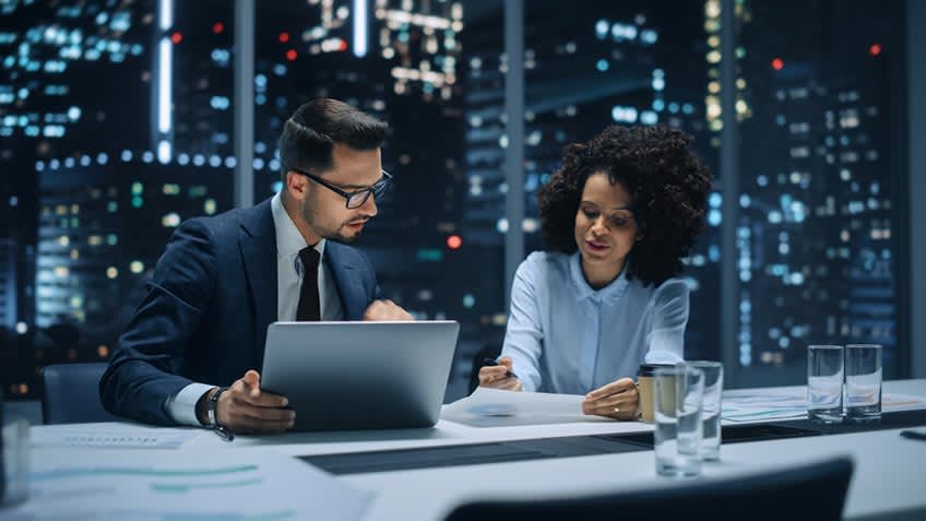 business leader implementing finance transformation dashboard with help of outsourcing expert