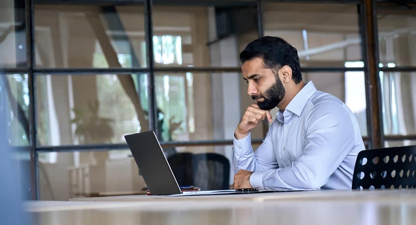 CEO searching online resources on ways to address outsourcing problems his company is facing