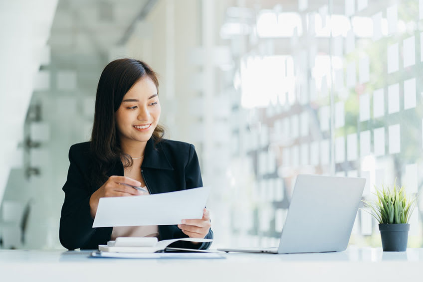 outsourced controller transcribing data from paper into computer