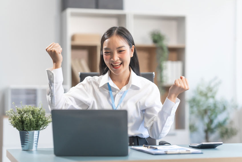 young female CPA happy for received positive feedback
