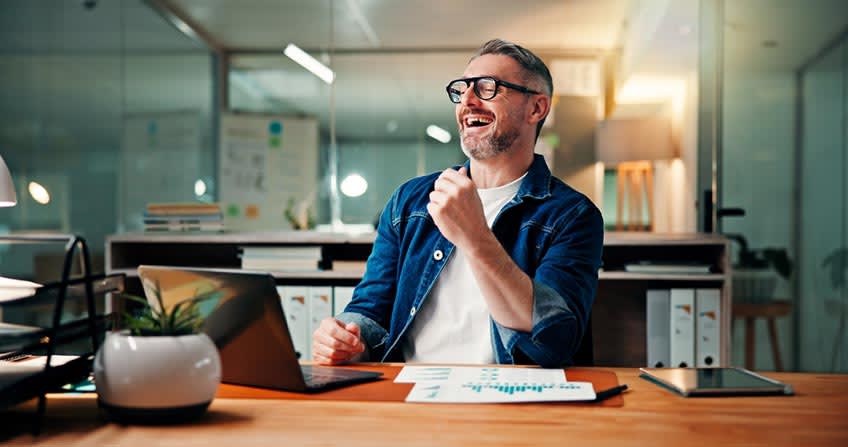 Happy accountant seeing the quick results of accounts payable outsourcing