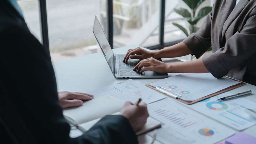 Accounting team working together on a project