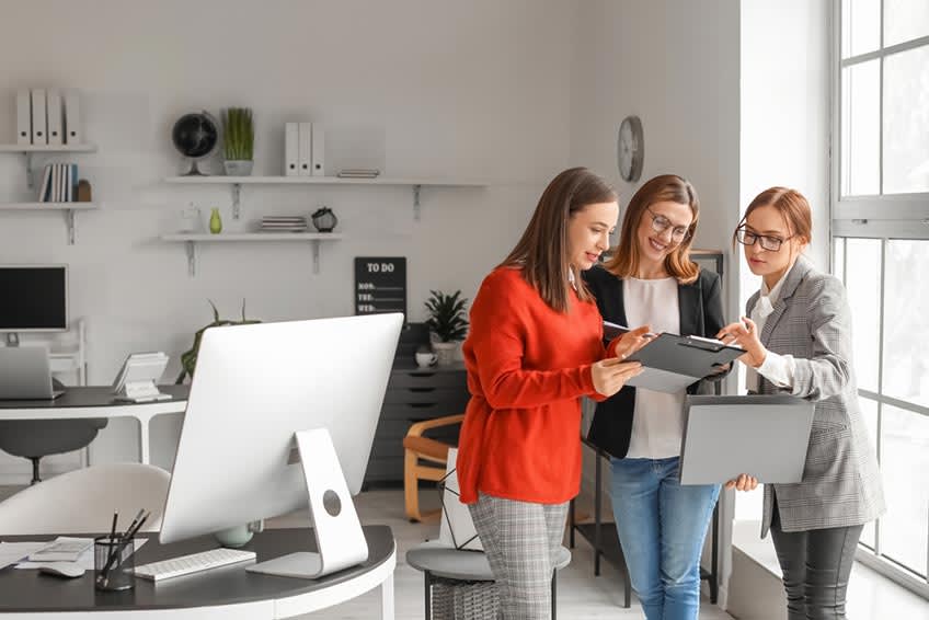 Modern finance team checking bookkeeping work