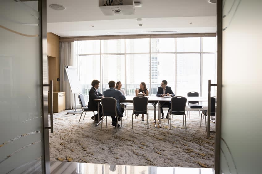 Finance and accounting BPO provider in meeting with business owner and company