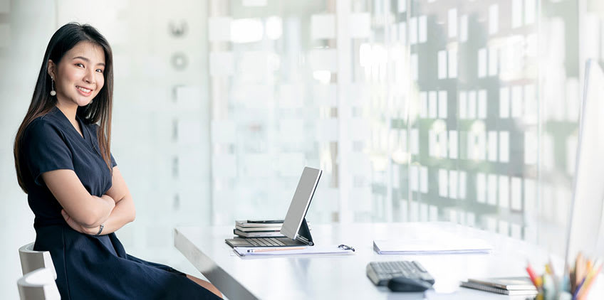Filipino professional smiling in office