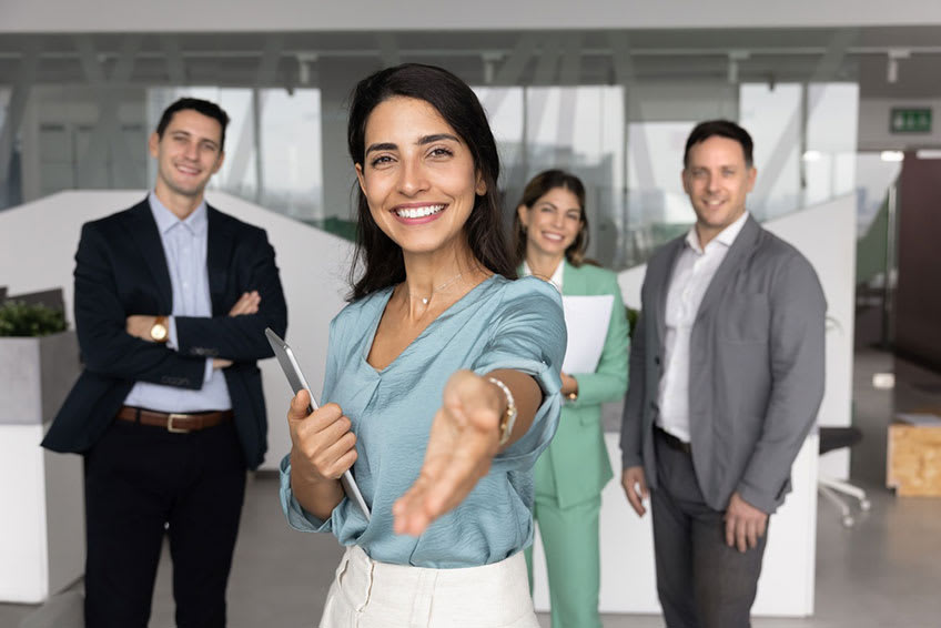 Corporate team welcoming new manager on their first day