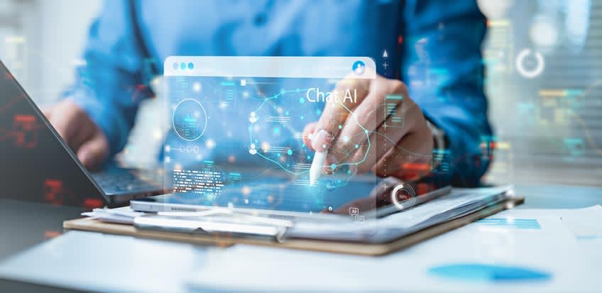 CFO interacting with new agentic AI tool that came included with a large tech investment