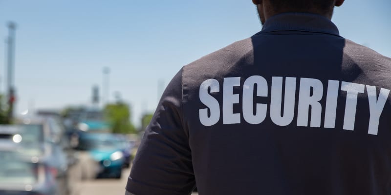 Security guard watching over parking area