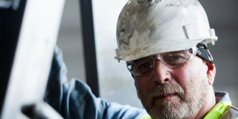 Image of a worker in a hard hat.