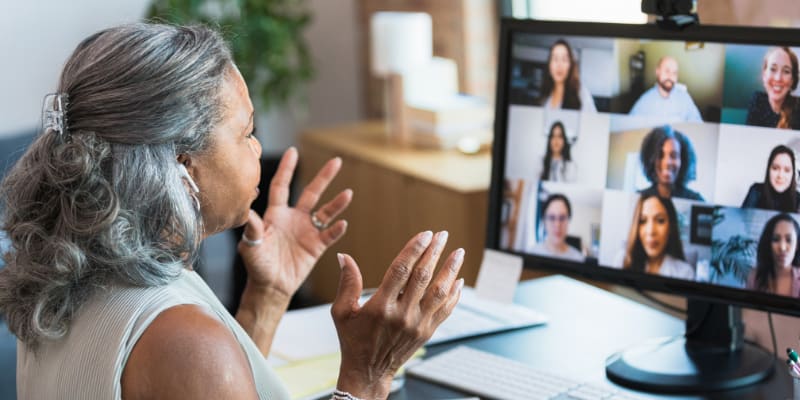 Woman on video conference call working remotely.