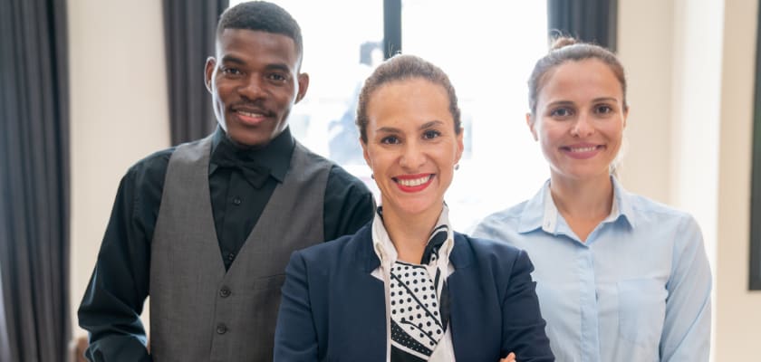 Portrait of hotel staff smiling