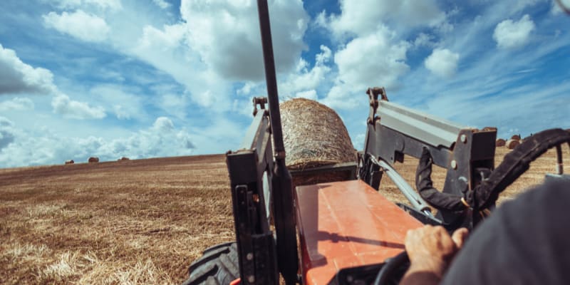 Shot of a tractor on a farm field.