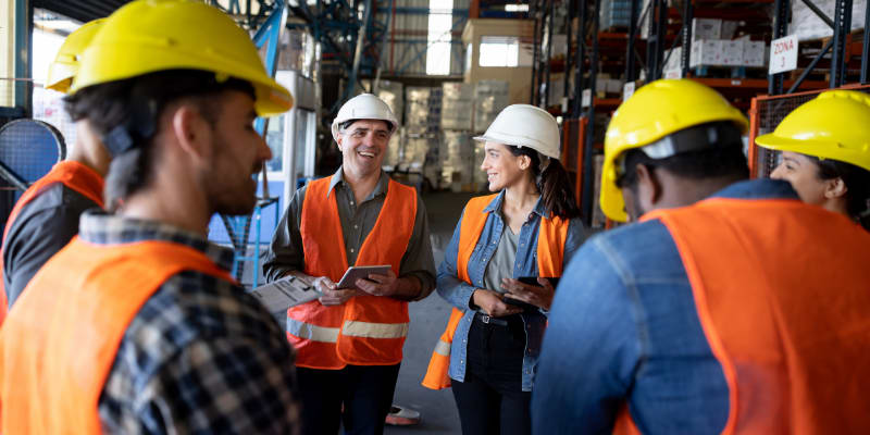 Staff meeting at a distribution warehouse