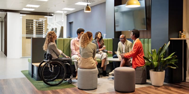 Business team meeting in modern office sitting area