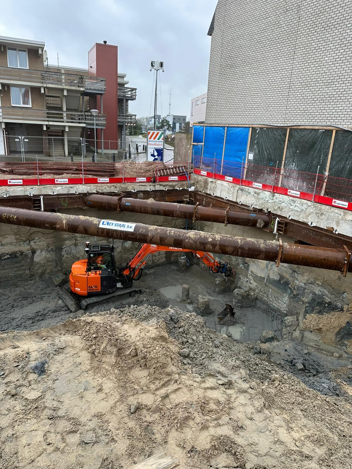 Civil contractor using construction technology on a machine in the field with a text overlay indicating this is the third article of a three-part series