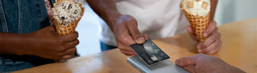 Customer using card for a tap to pay transaction for ice cream