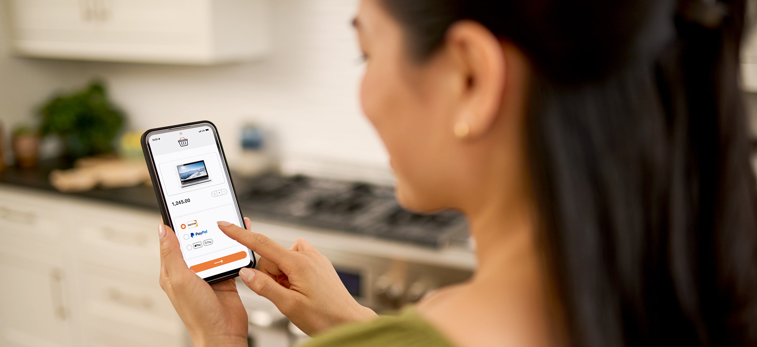 Person using smartphone to shop online and choose payment method at home.