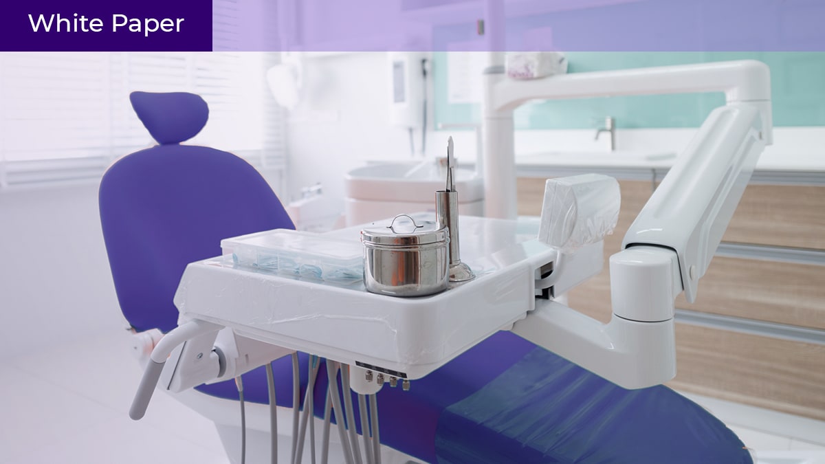 A blue dentist's chair in a dental office, with the label "White Paper" at the top of the image.