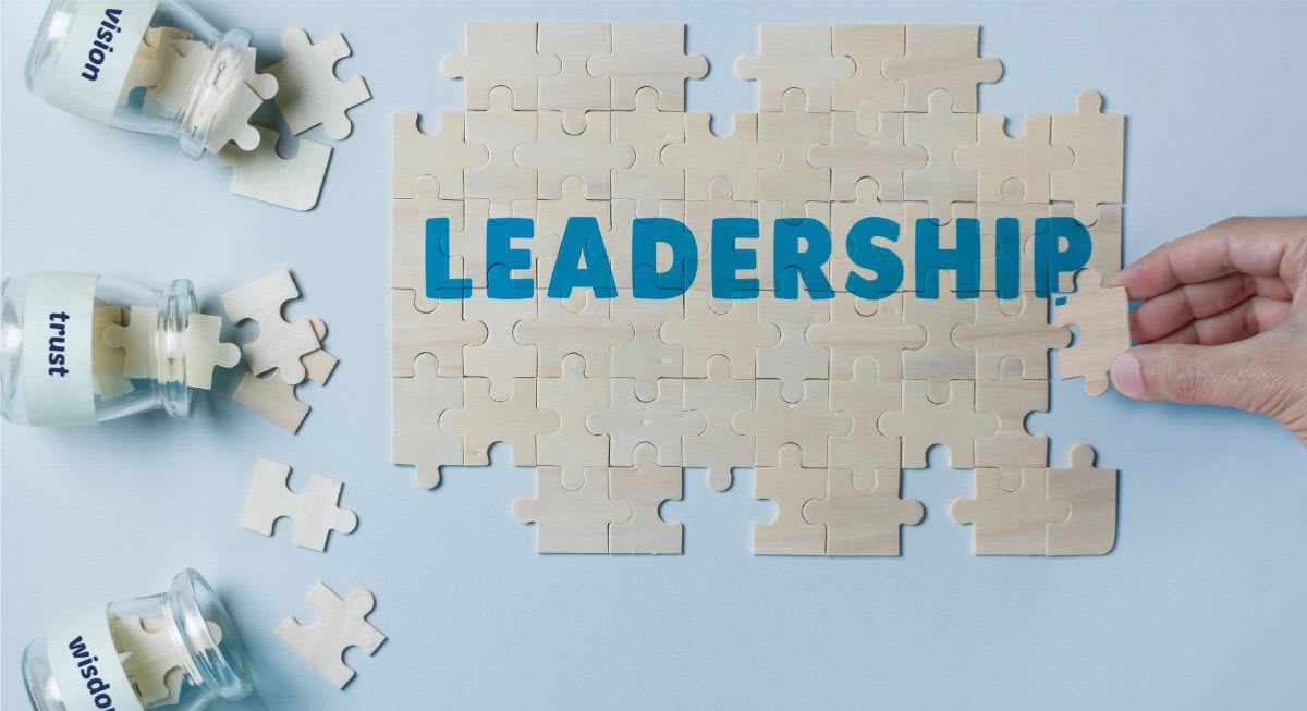 leadership spelled out on scrabble tiles