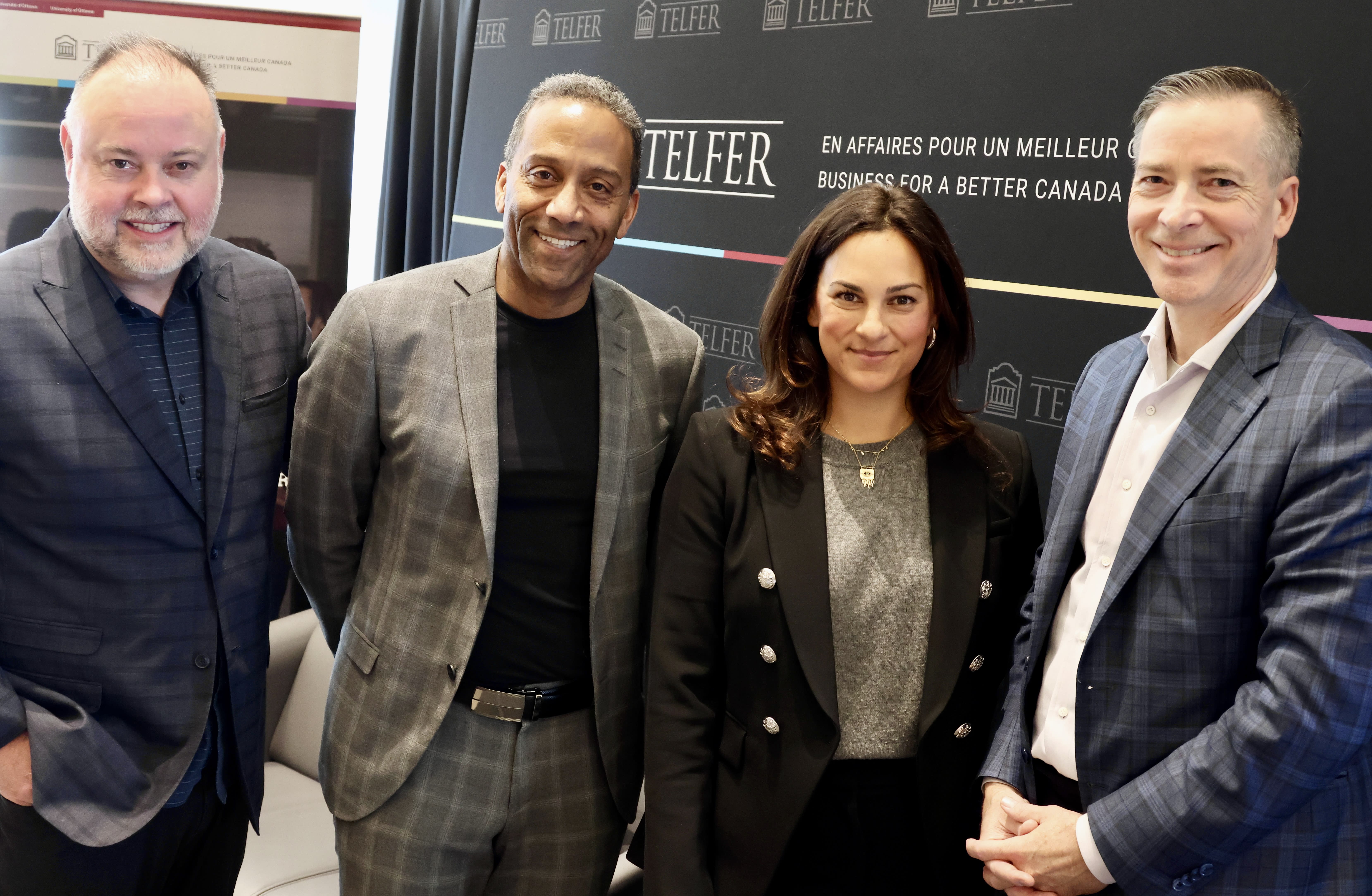 From left, Michael Curran, Dean Brutus, Leslie Feldman and Andrew Waitman standing together for a picture.