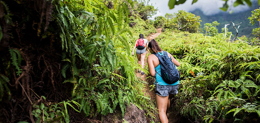two friends hiking in Hawaii