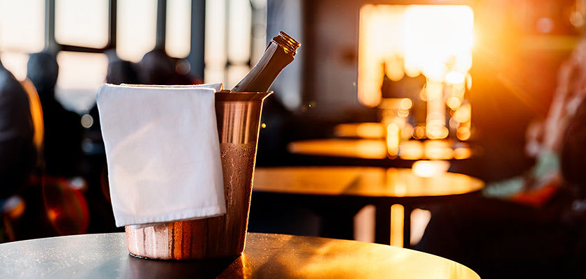 champagne in a bucket of ice within Cathedrale restaurant