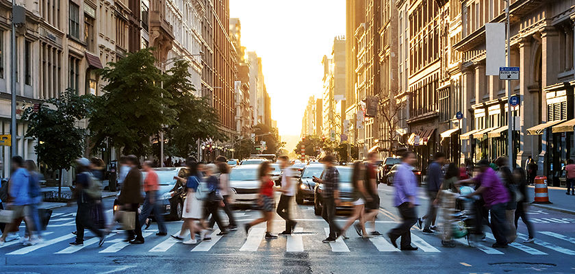 pedestrians crossing a New York city street