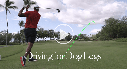 Pro golfer driving for dog legs