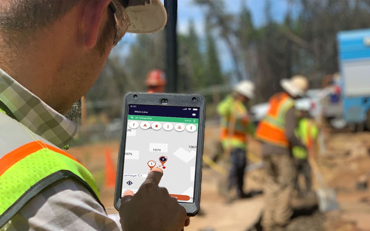 Field user using Locusview mobile app on a tablet