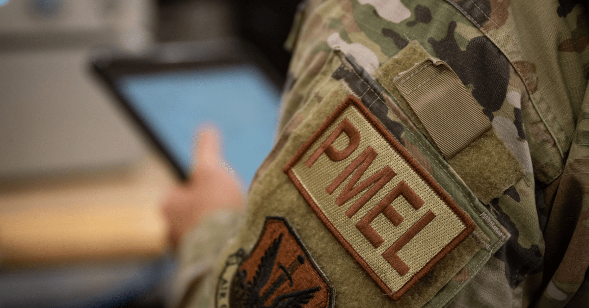 Service member looking at a tablet