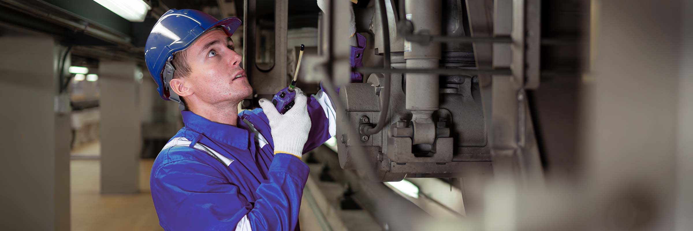 Mine worker following safety protocols using lone worker solution from Bell.