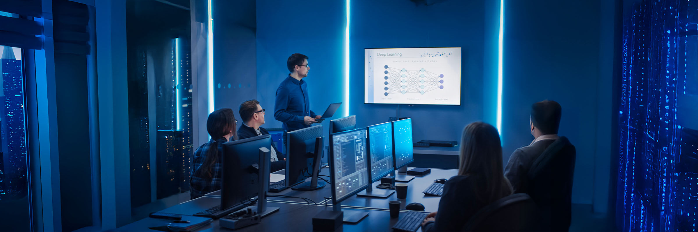 Five people review a presentation on responsible AI implementation and proper AI governance.  