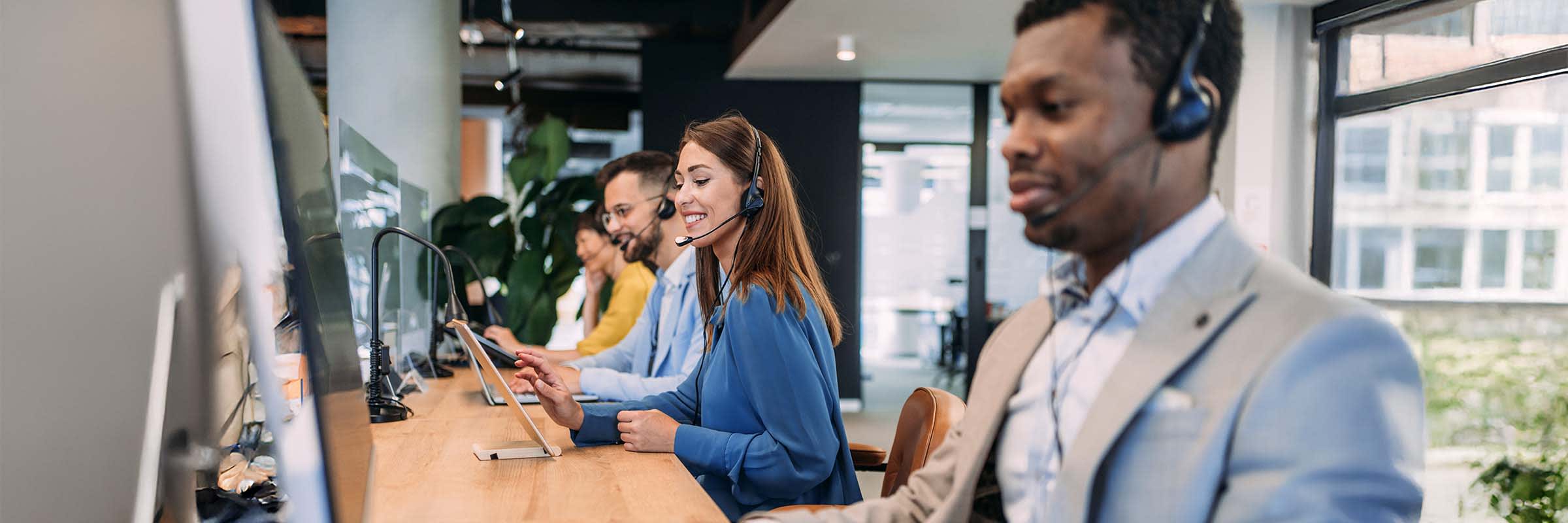 Contact center agents leveraging AI to improve the customer experience for financial services. 