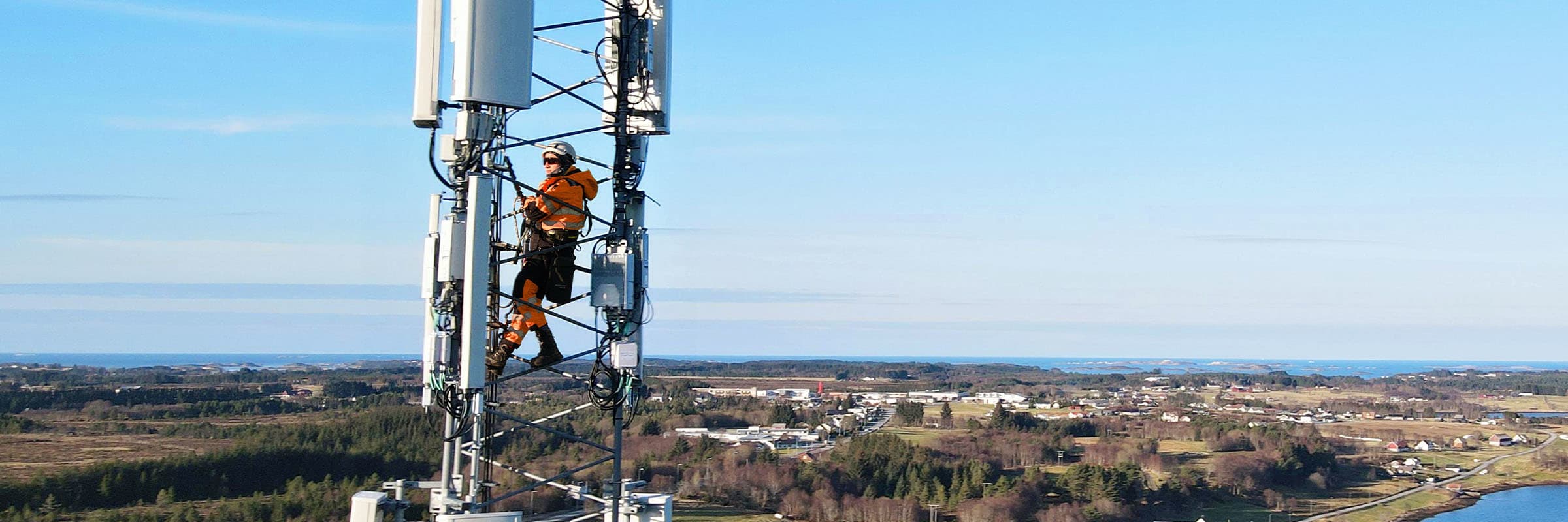 Bell technician working on a 5G tower.