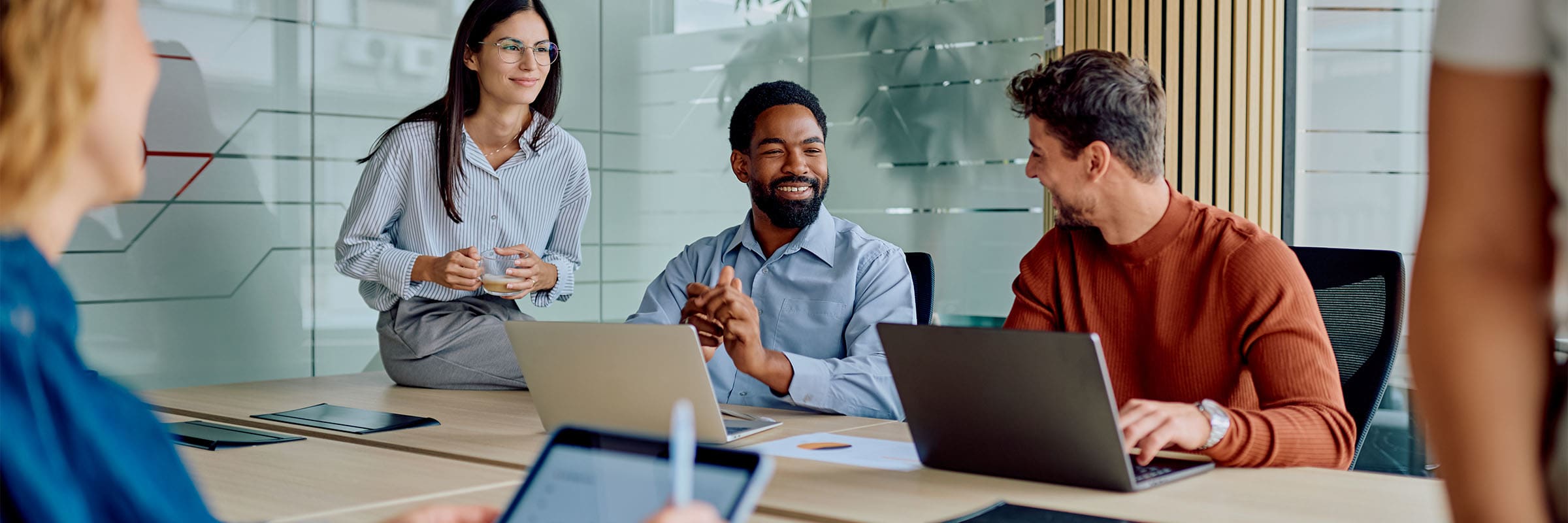 Bell employees discussing business adoption of artificial intelligence.