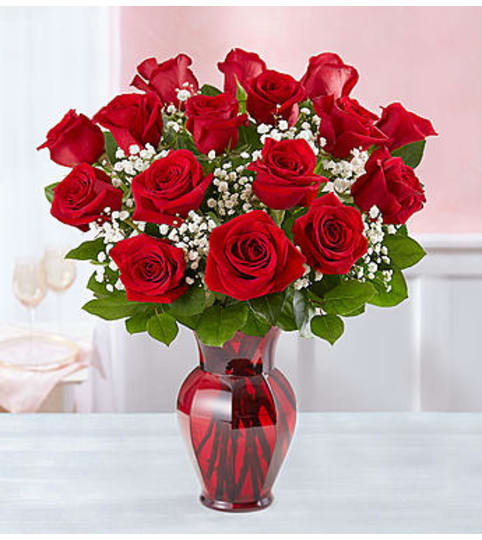 Blooming Love™ Red Roses in Red Vase image