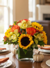 Thanksgiving — autumn flowers with fall colors and harvest decorations