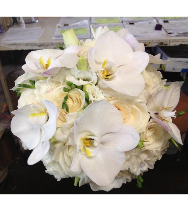 vendela fressias, lisianthus & philanopsis bridal bouquet 1