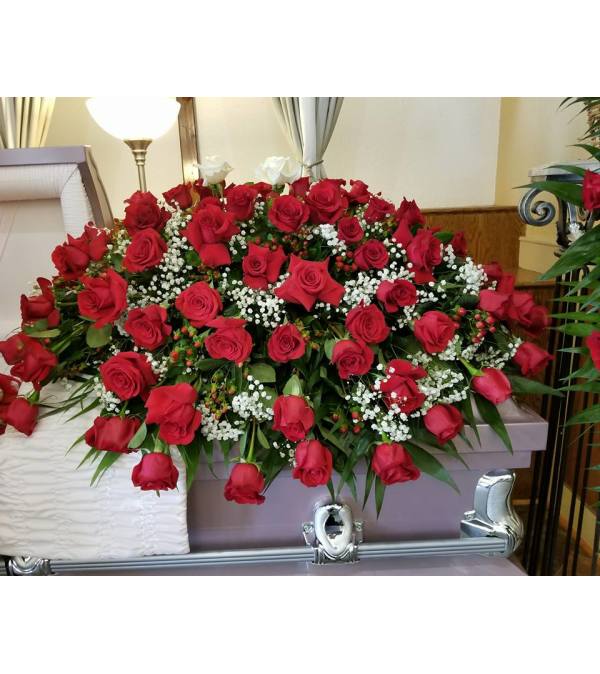 Red roses casket spray