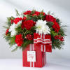 DaySpring® Jesus is the Gift™ Bouquet By FTD® - Deluxe. An arrangement by Lori's Hearts and Flowers.