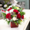 Hugs at Christmas - Standard. An arrangement by In Bloom.
